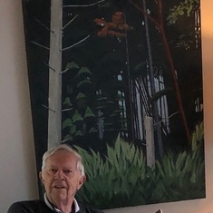 Jim in front of one of his gorgeous bold acrylic paintings of nature.