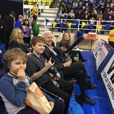 All the grandchildren with their Grandpa at a UBC Thunderbirds basketball game 