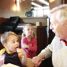Grandpa, probably telling cute jokes to grandson Ilya and granddaughter Isabella