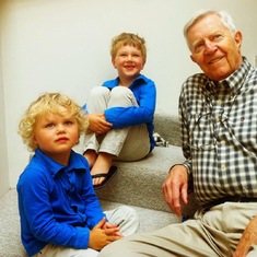 With grandsons Henry and Caron