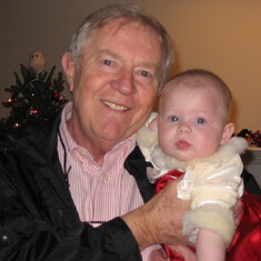 Jim with his baby granddaughter Isabella, Christmas 2005.