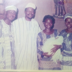 Photo taken at Dotun's first child's naming. The parents with bro. Layi and wife(carrying d baby)