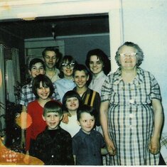 This is Richard with his siblings and his mother when he was young.