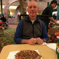 Rich enjoying his favorite Marion's Pizza