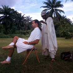 Rick getting haircut in Nigeria