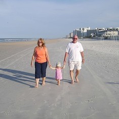 Sarah and Grandma Robbie  and Grandpa Tim in New Smyrna Beach 2009