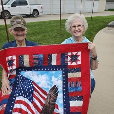 Dad receives the quilt of valor