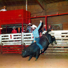 Bob riding a bull at the Kowbell in Mansfield, Texas