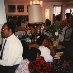 Daddy plays piano and sings on 49th street in L.A. at grandmothers house. Aunt Pheno and Aunt Oletha listen and sing.