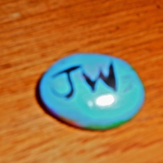 Judy's initials were on the other side of the painted rock that Chuck found while on a walk near Robert and Joy's house.