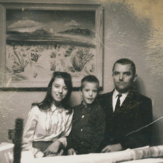 Mary, Jim, Robert in front of his oil painting of the desert. Las Cruces, NM 1966