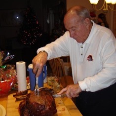 Bob cutting the Prime Rib at Craig's house. He LOVED good food.