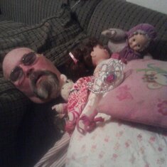 We were visiting Tina in Vegas and Bob fell asleep. Theresa made him comfortable with her blanket and doll