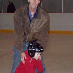 teaching Noah to skate at Kits rink