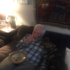 Sharing a fausnut with granddog Joannie