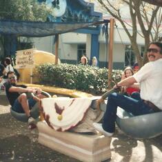 Rolf and Rick teeter tottering in disney world