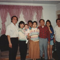 Kuya Romy and I pay a visit to new immigrants--the Linchangco family.