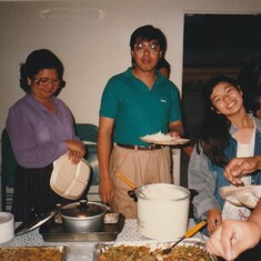 My brother Arnel is flanked by ate Rosie and Rose Lynn during fellowship time at FFAUMCSGV (June 1988).