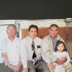 Rianna being held by dad.
Lolo Oro and Uncle Noel next to dad.
