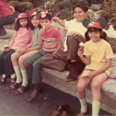Dad at the happiest place on earth w Laarni, Heidi, my brother Romy Jr and I.