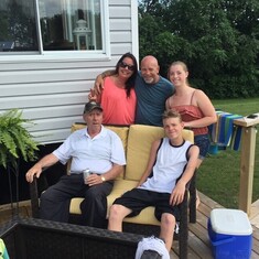Ron with his son, Dave, partner Nicole, and grandchildren Samantha and Ryan