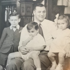 The Ronald, Robert, and Karen with their Dad.