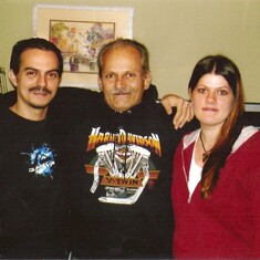 Dad, me, and my big brother Ronnie. Taken in 2009 in California