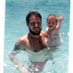 Dad and me when I was a baby. We look so happy.