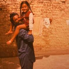 Young Roopa doing Reverse Piggy Back ride on Papa :)