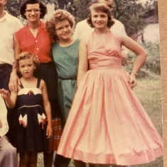 Love this picture of my mom Rosalie in this pink dress, 1950s