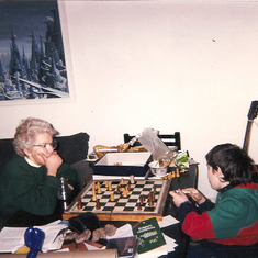 Rosalie and Andy playing chess in Brussels