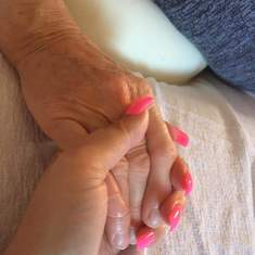 Holding hands till her last day. Mom please come back