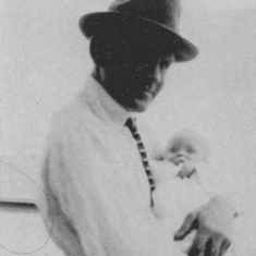 Frederick wilhelm Kahlbau holding his daug 1 mo old Rose Marie
