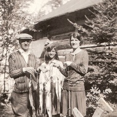 1930.  White Buck Lodge, Big Stone Lake, Three Lakes, Wisconsin. Rosemary with parents, Justin and Doris Whiting.