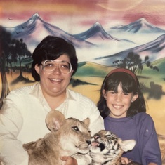 1985. Mom kept me home from school and we went to the mall for pictures with a lion and tiger.  