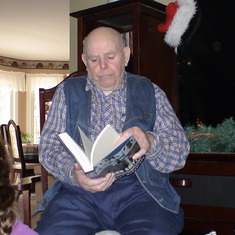 Dad looking at Conn Smythe Book Christmas 2012
