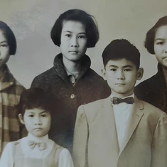 Rowena (bottom left, first row) was the youngest child in her family.