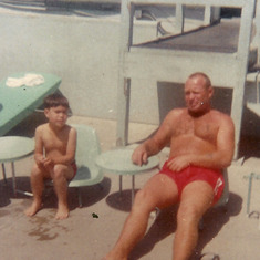 Roy with his dad at the Navy Base pool