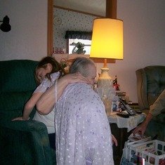Lauren Shaulis giving her grand mother a hug Dorothy Shaulis