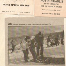 Dad teaching skiing, and several of his business cards,of his many busiesses