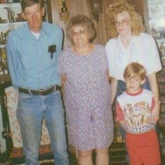 Roy standing by in Mother June Domer, oldest daught Tracey, and Roy's grand son Zac