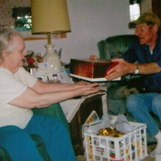 Roy and Dorothy exchanging gifts