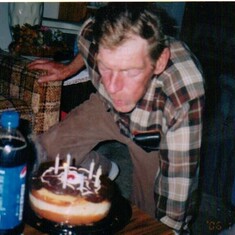 dad blowing out his 68 years