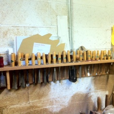 Carving chisels arrayed in the Pittsburgh shop