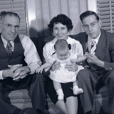 Lloyd, Ruth and Jim with Susan,  Christmas 1947