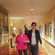 Ruth is escorted by her grandson, Hayden and followed by her son in law, Scott 