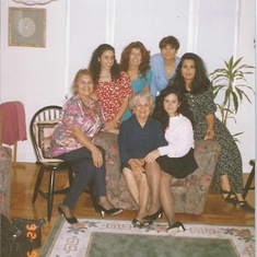 At Adrianne's bridal shower 1992: Ruth, Grace, Idalia, Donna, Lisa. Rosita and Adrianne seated inside chair.