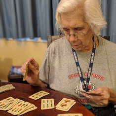 Ruth is playing the Italian card game "Scopa". She was highly competitive and loved card games. 
