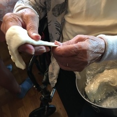Mom showing how to make hand pulled noodles