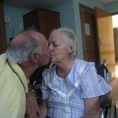 Dad and Mom kiss